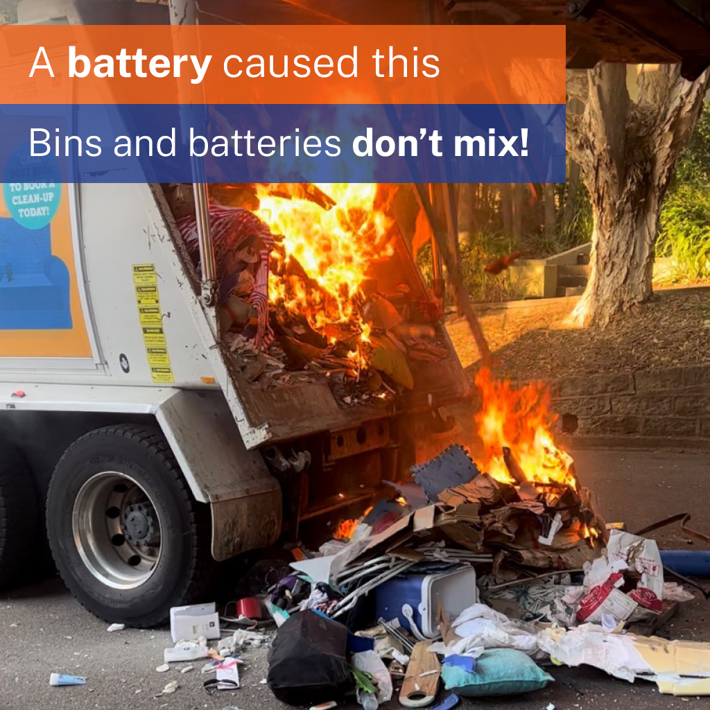 Waste track with load on fire caused by batteries.